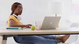 black-female-student-pretty-young-woman-studying-at-home-using-laptop-itep-test